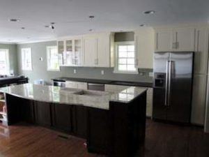 A newly remodeled kitchen with granite countertops
